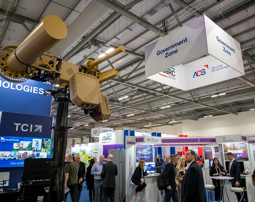 Visitors explore exhibition stands in the Government Zone at Security & Policing.