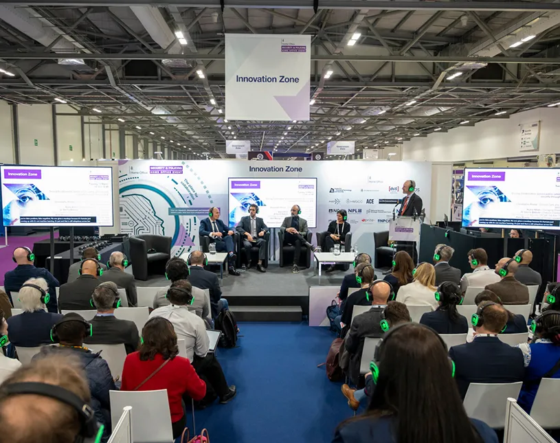 An audience watches a presentation in the Innovation Zone at Security & Policing.