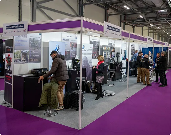 Visitors browse exhibition stands in the counter-threat demonstration area.